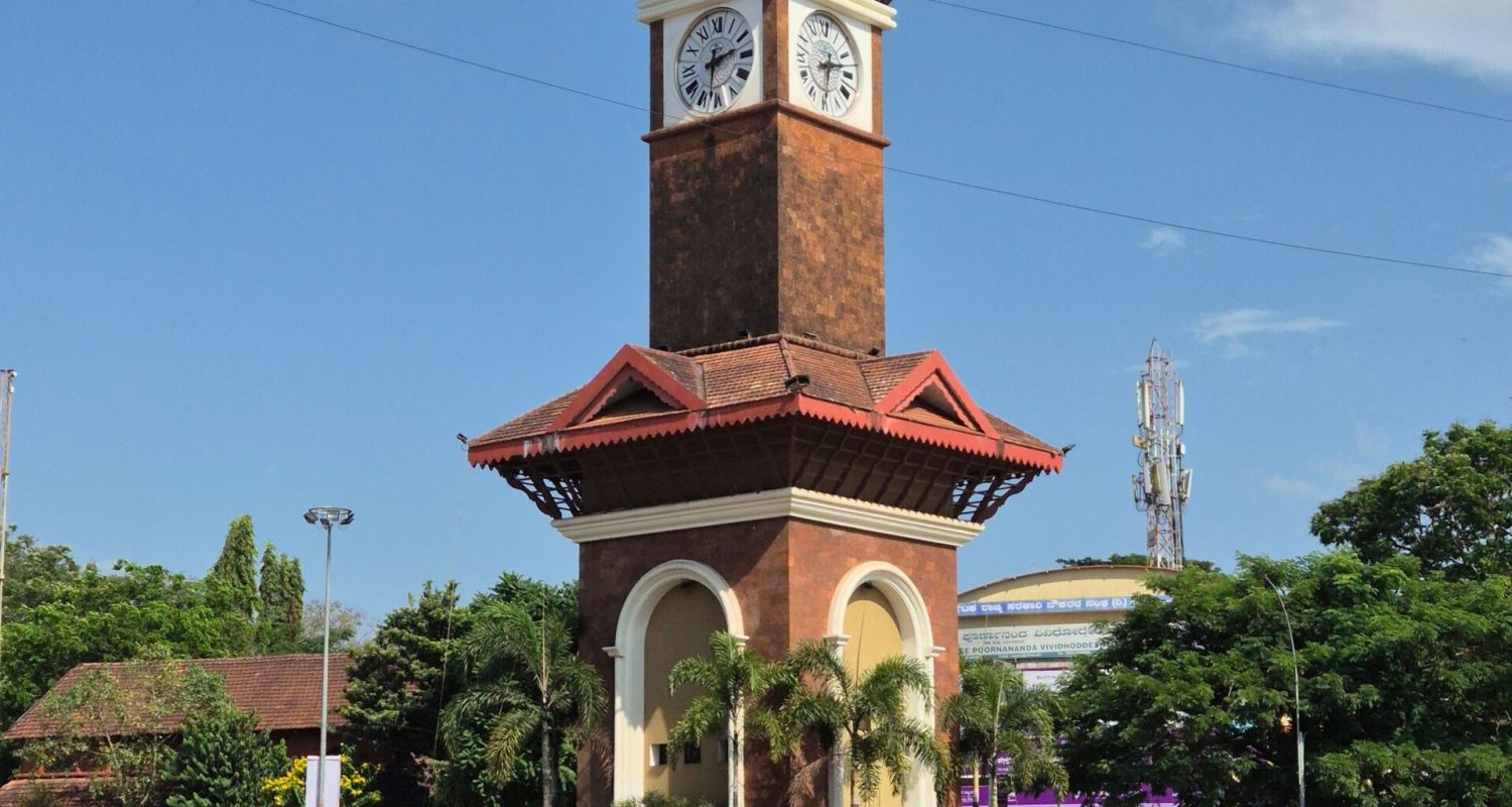 Scenic view of the iconic Mangaluru clock tower against a clear blue sky.